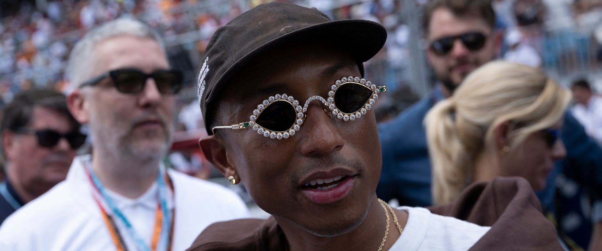 Pharrell Williams walks on the grid before the Miami Grand Prix at the Miami International Autodrome May 8, 2022, in Miami Gardens, Florida. (Photo by Brendan Smialowski / AFP) (Photo by BRENDAN SMIALOWSKI/AFP via Getty Images)