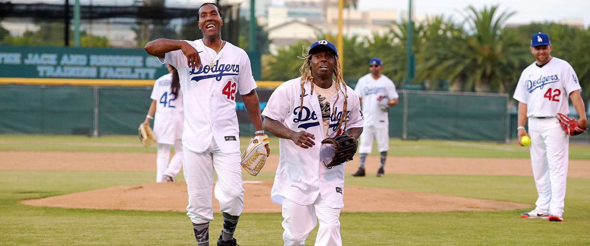 LOS ANGELES, CALIFORNIA - JULY 17: Lil Wayne on the field during the Bumpboxx Honors 75th Anniversary Of Jackie Robinson Breaking The Color Barrier With Celebrity Softball Game At Jackie Robinson Field at Jackie Robinson Stadium on July 17, 2022 in Los Angeles, California