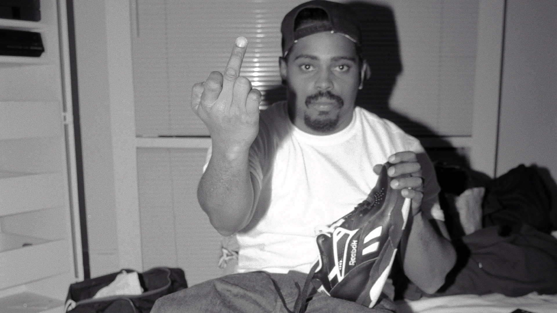 Sen Dog of Cypress Hill giving the middle finger