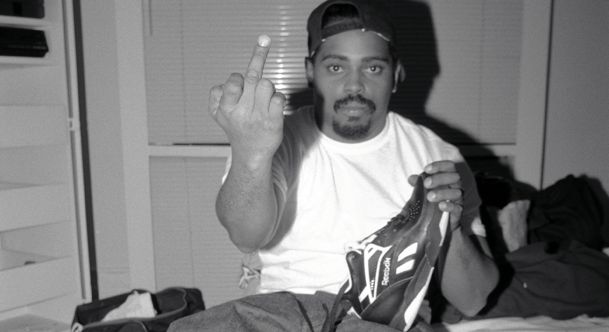 Sen Dog of Cypress Hill giving the middle finger