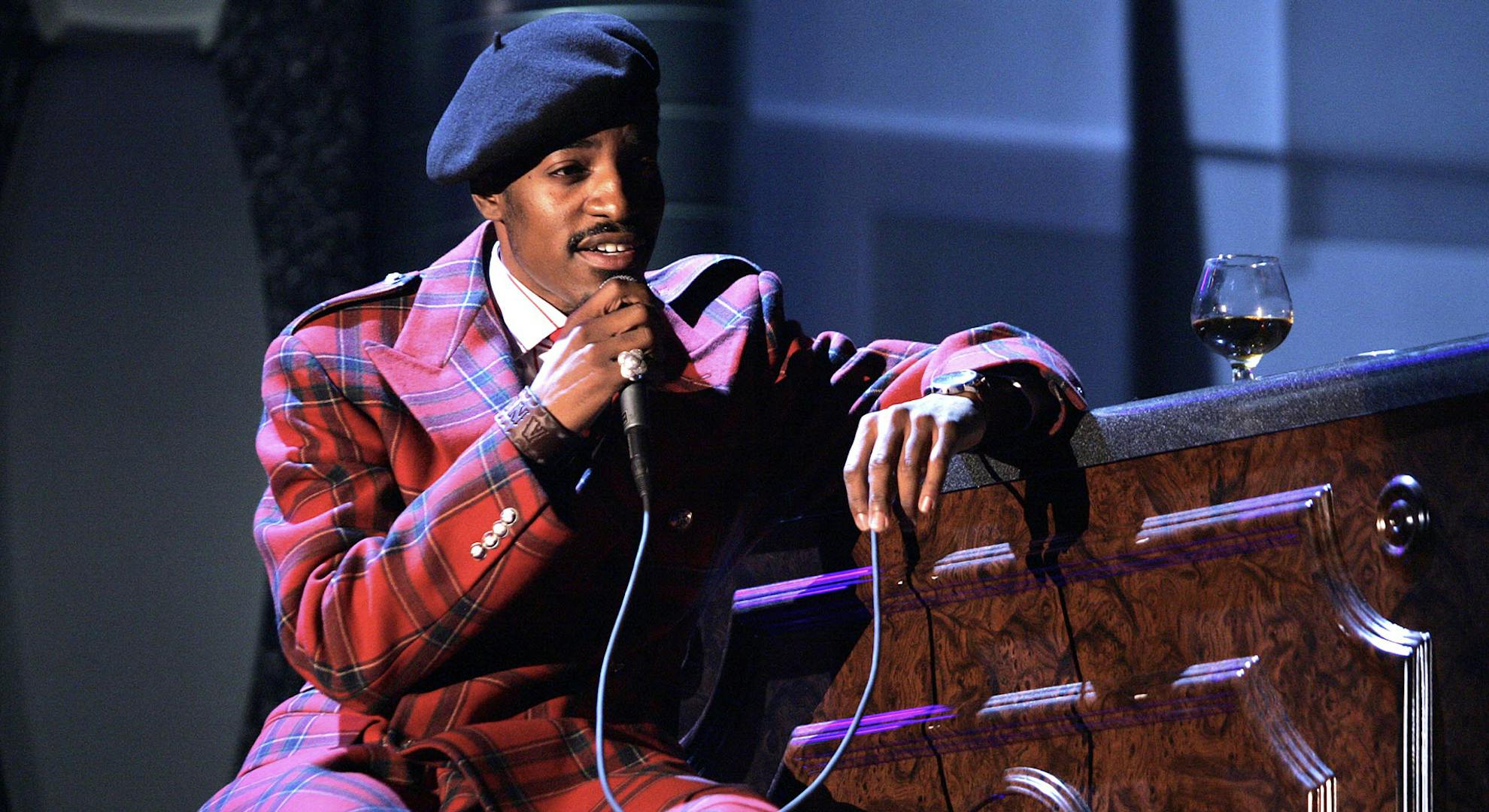 Andre 3000 of OutKast performs on stage at the "Fashion Rocks" concert held at Radio City Music Hall on September 8, 2004 in New York City.