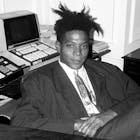 Jean - Michel Basquiat at the surprise birthday party for Susanne Bartsch at the Rainbow Roof, at Steven Greenberg's office, 30 Rockefeller Plaza. Thursday, September 19, 1985