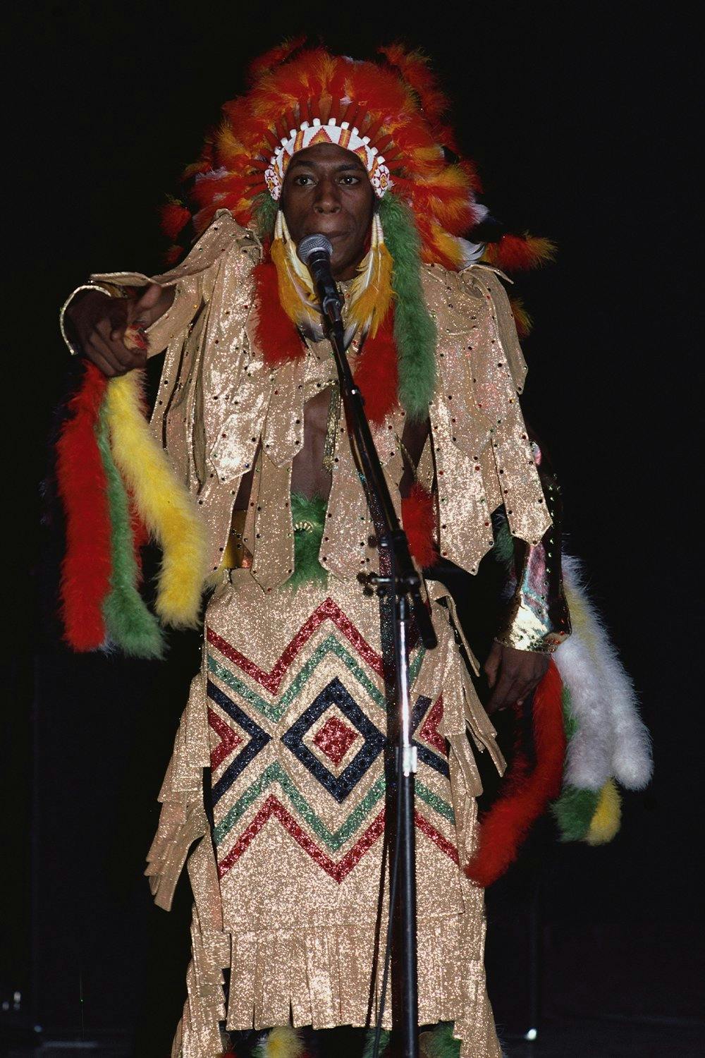Pow Wow of Soul Sonic Force wears a Native American costume on stage. (Photo by Geoff Butler/Corbis/VCG via Getty Images)