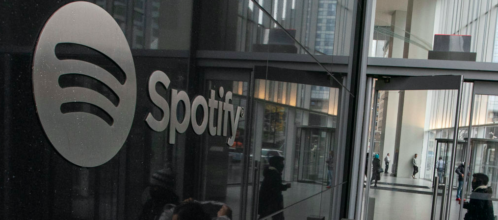NEW YORK, NEW YORK - JANUARY 23: People exit the Spotify headquarters building in Lower Manhattan on January 23, 2023 in New York City. Spotify announced Monday they will be cutting 6% of its global workforce. 
