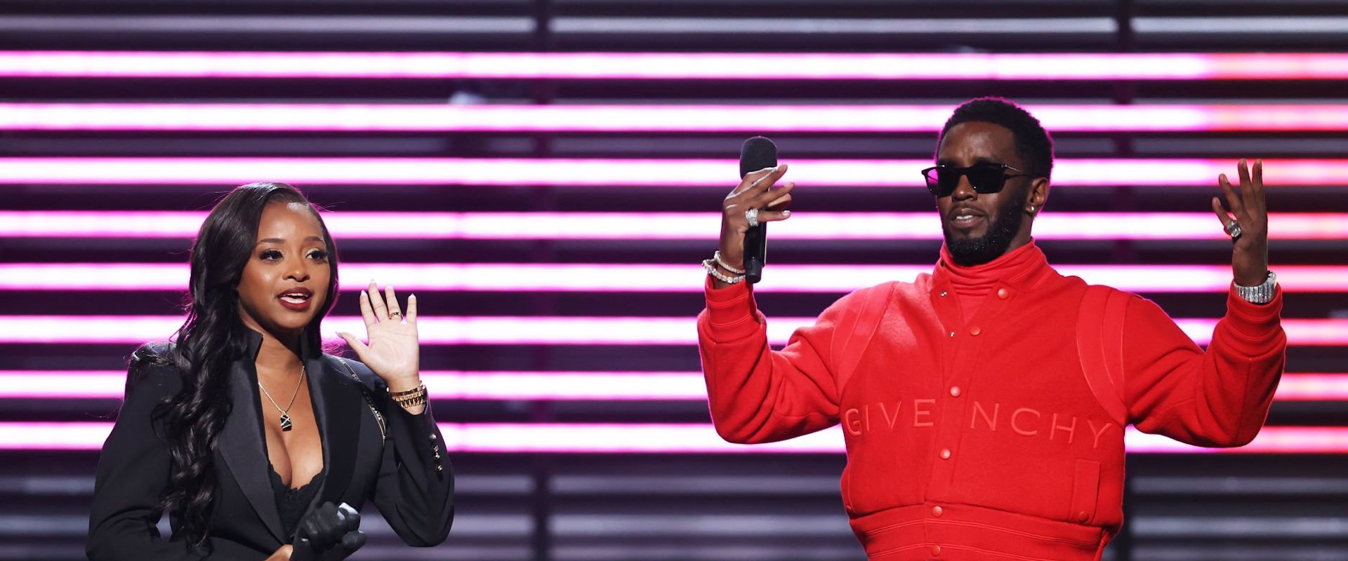 amika Mallory accepts the REVOLT Black Excellence award from host Sean ‘Diddy’ Combs on stage during the 2022 Billboard Music Awards held at the MGM Grand Garden Arena on May 15, 2022. -- (Photo by Rich Polk/NBCU Photo Bank via Getty Images)