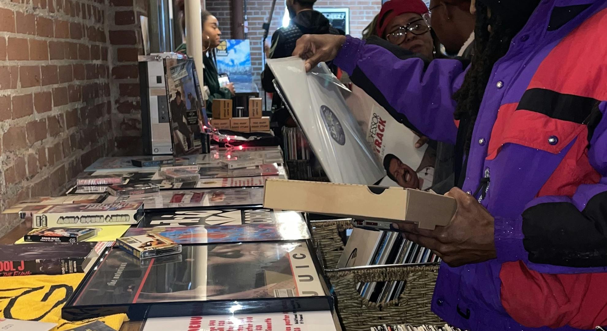 Attendees peruse the vinyl at Rock The Bells' Remember The Rhyme event in Atlanta