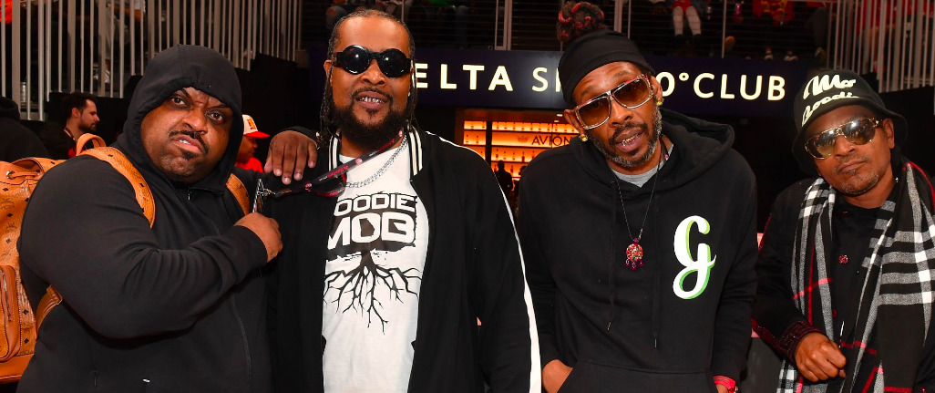 ATLANTA, GEORGIA - NOVEMBER 27: CeeLo Green, Khujo, Big Gipp, and T-Mo of Goodie Mob attend the game between the Miami Heat and the Atlanta Hawks at State Farm Arena on November 27, 2022 in Atlanta, Georgia. 