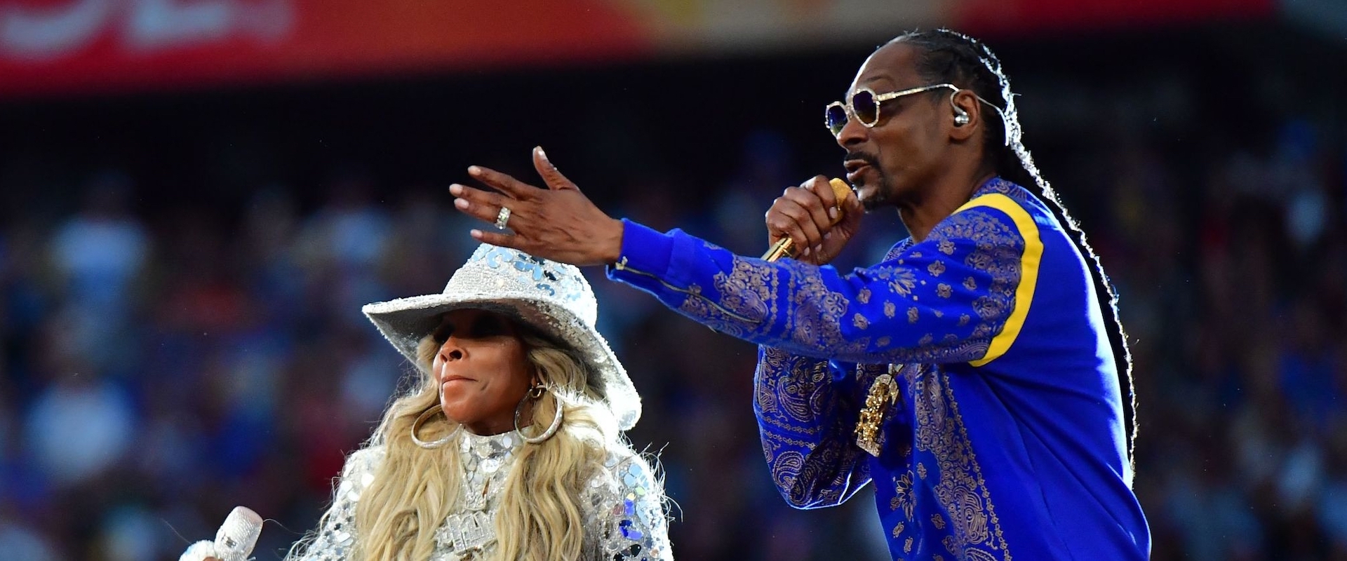 Mary J. Blige (L) and US rapper Snoop Dogg perform during the halftime show of Super Bowl LVI between the Los Angeles Rams and the Cincinnati Bengals at SoFi Stadium in Inglewood, California, on February 13, 2022.