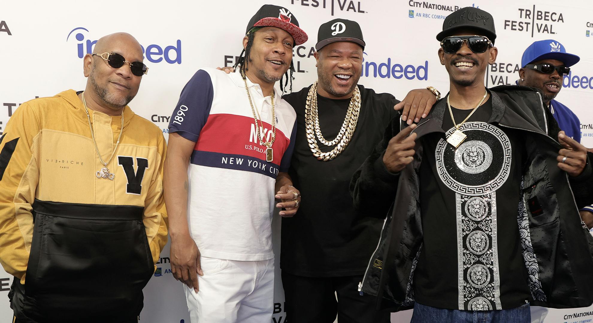 DJ Quik, Xzibit, Kurupt, and Daz pose with cast and crew at the "The DOC" premiere during the 2022 Tribeca Festival at Beacon Theatre on June 10, 2022 in New York City. (Photo by Michael Loccisano/Getty Images for Tribeca Festival )