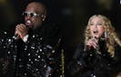 Madonna and Cee-Lo Green perform during the Bridgesone Super Bowl XLVI Halftime Show at Lucas Oil Stadium on February 5, 2012 in Indianapolis, Indiana. 