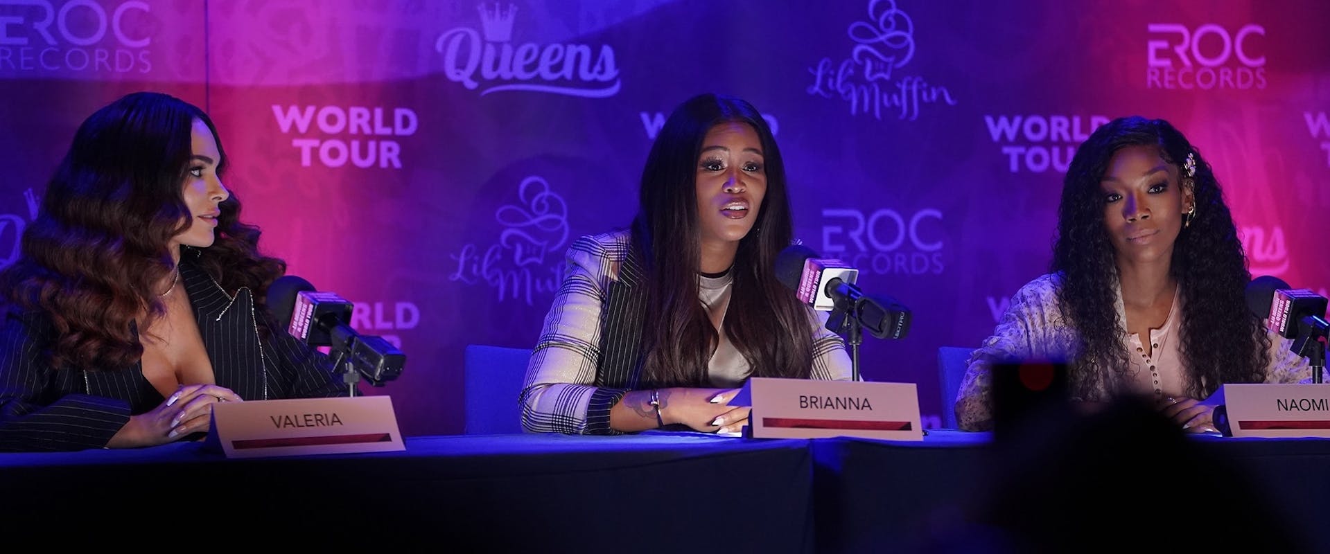 (L-R) Valeria (Nadine Valezquez), Brianna (Eve Cooper), and Naomi (Brandy Norwood) field questions during a press conference in a scene from QUEENS 