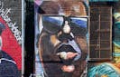 A mural of The Notorious BIG on St. Nicholas Ave and Troutman St. by artist Danielle Mastrion.