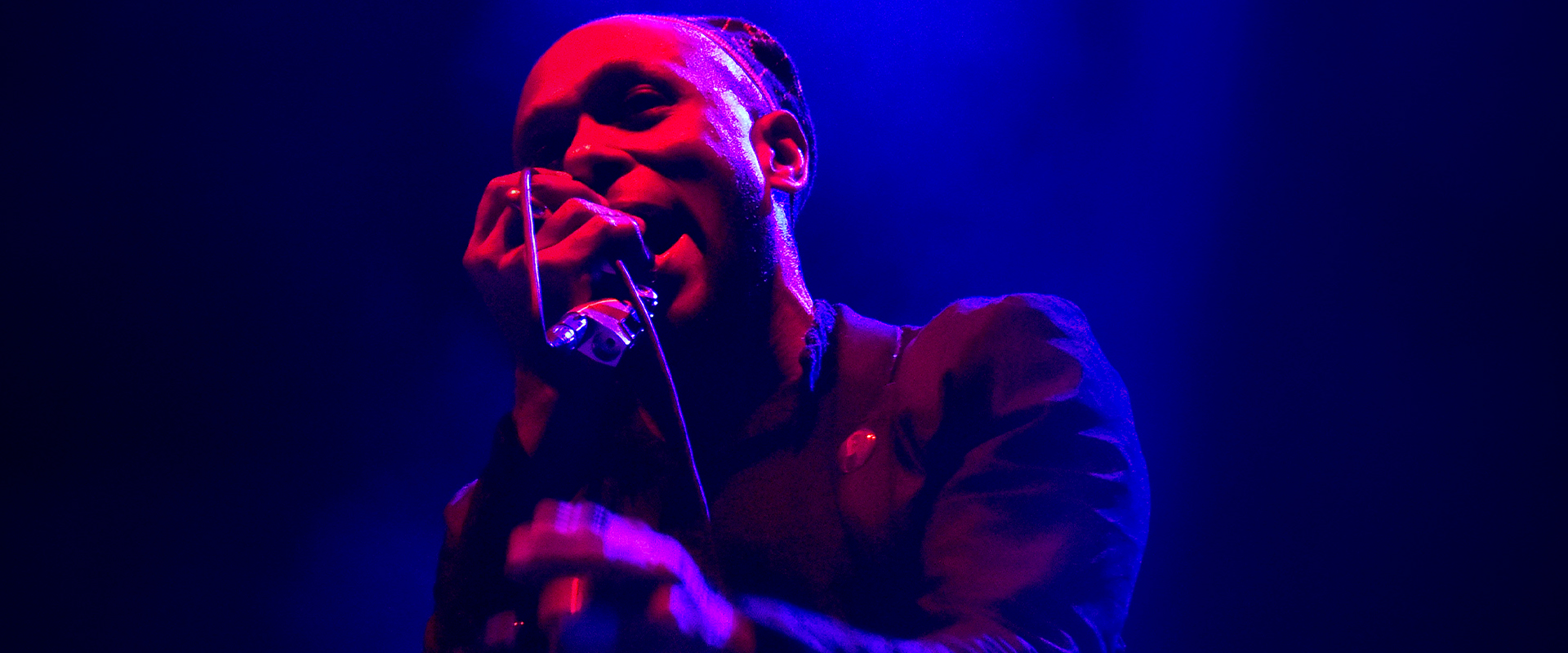 Yasiin Bey performs during the Black on Both Sides 20th Anniversary concert at The Greek Theatre on October 25, 2019 in Berkeley, California