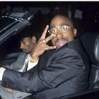 Tupac and Snoop in a car