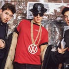 Portrait of members of American Rap group Beastie Boys as they pose in front of a mural (by Keith Haring), 1987. Pictured are, from left, Mike D (born Michael Diamond), MCA (born Adam Yauch, 1964 - 2012), and Ad-Rock (born Adam Horovitz)