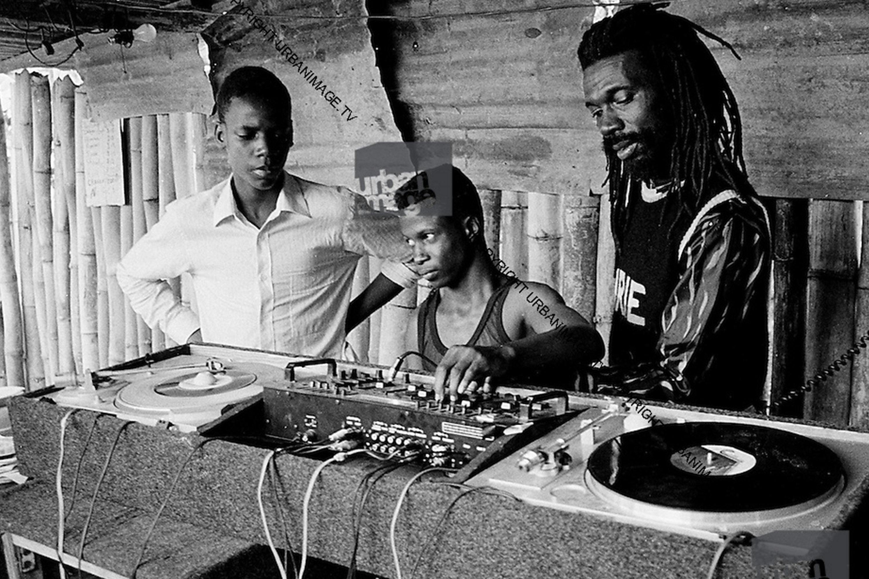 Lee Scratch Perry inside a recording studio. 