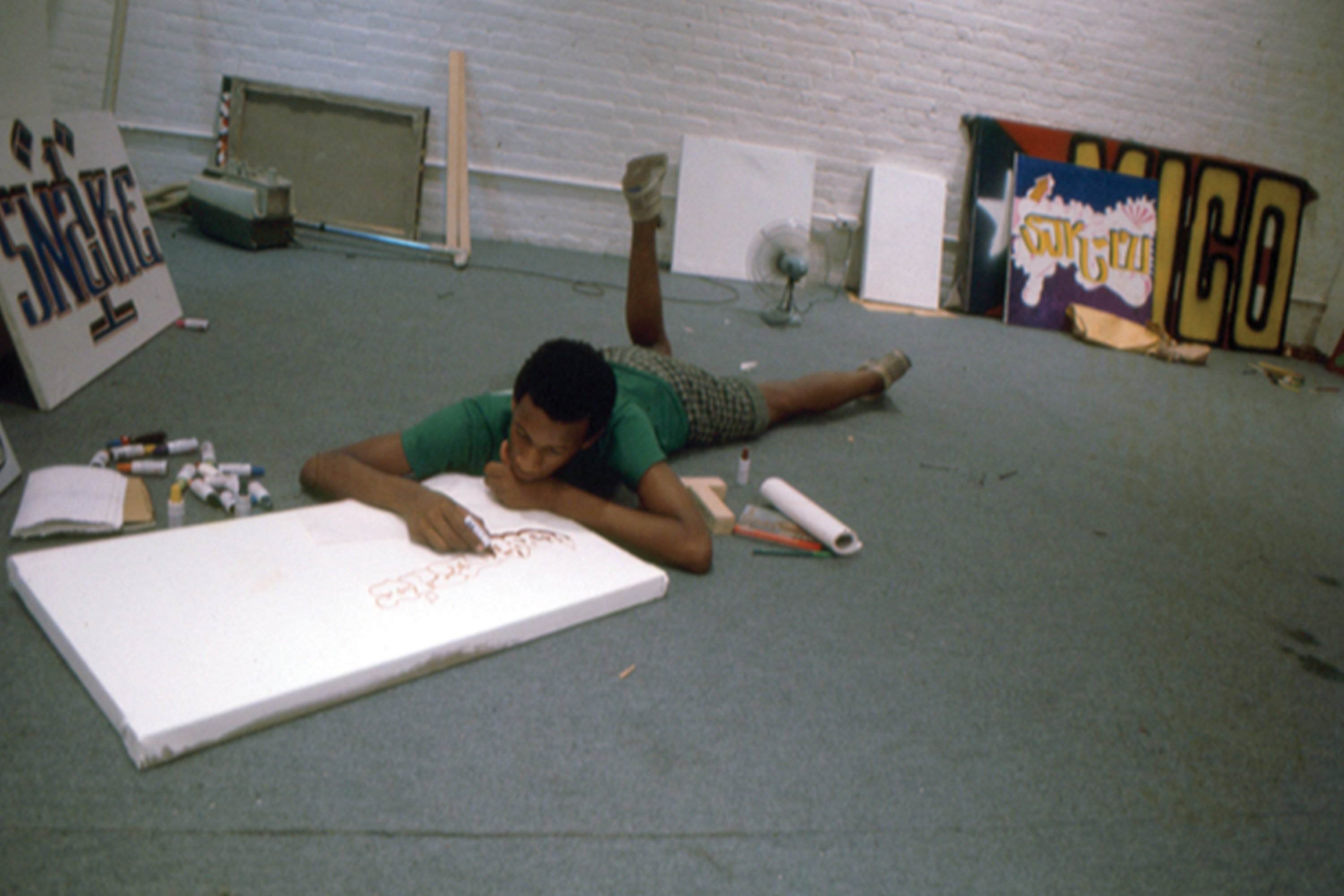 PHASE 2 ON THE FLOOR WORKING ON A CANVAS
