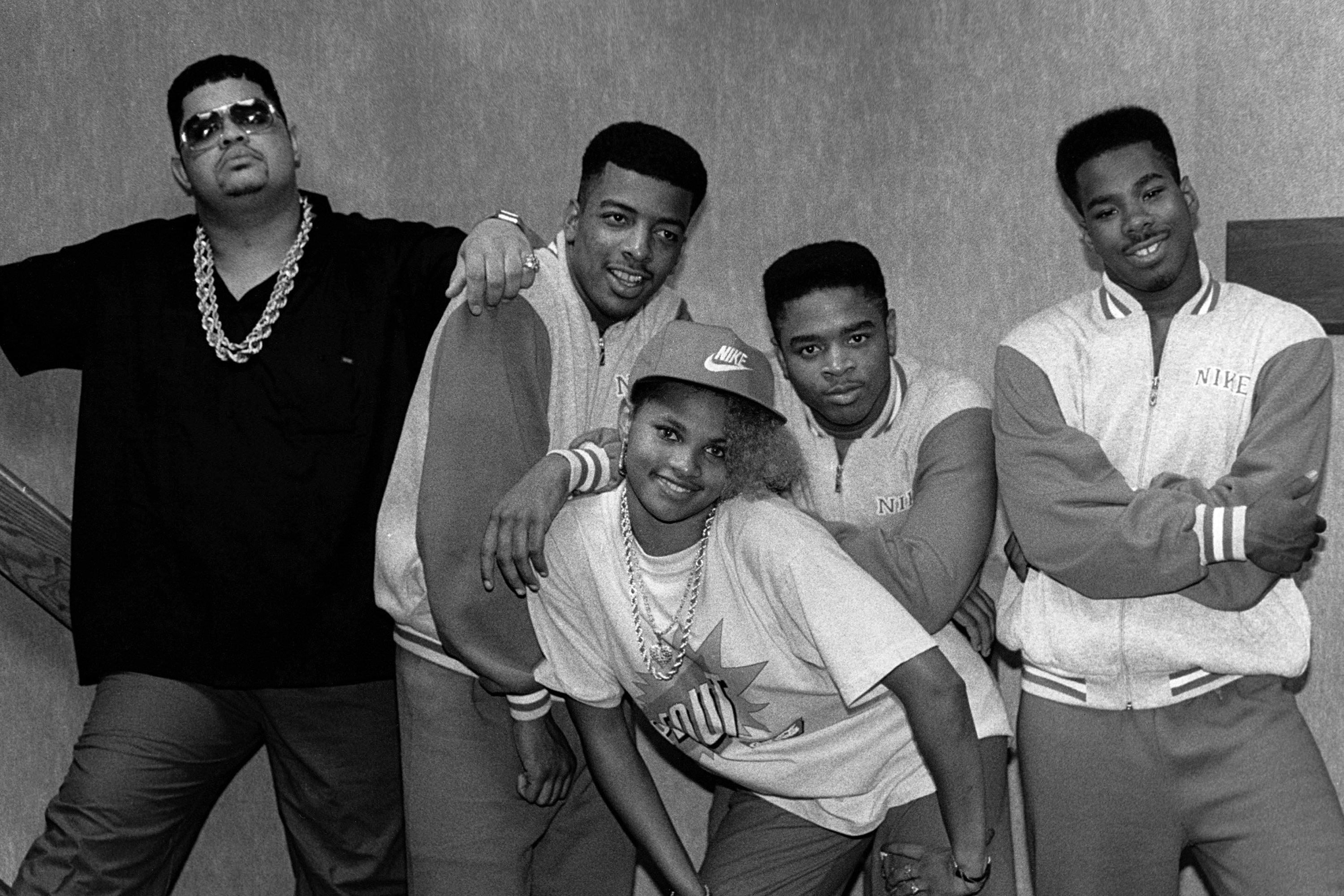 Heavy D And The Boyz pose for a photo with Pepa (Sandra Denton) of Salt-
N-Pepa backstage in 1988