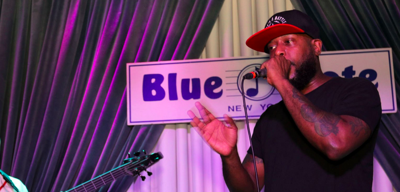 NEW YORK, NY - NOVEMBER 10: Talib Kweli (r) and bassist Brady Watt perform at Blue Note Jazz Club on November 10, 2017 in New York City. 