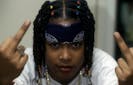  Rapper Da Brat gives the Middle Finger Obscene Gesture when she appears in a portrait taken backstage when she performs at The Manhattan Center on July 10, 1994 in New York City.