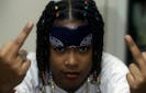  Rapper Da Brat gives the Middle Finger Obscene Gesture when she appears in a portrait taken backstage when she performs at The Manhattan Center on July 10, 1994 in New York City.