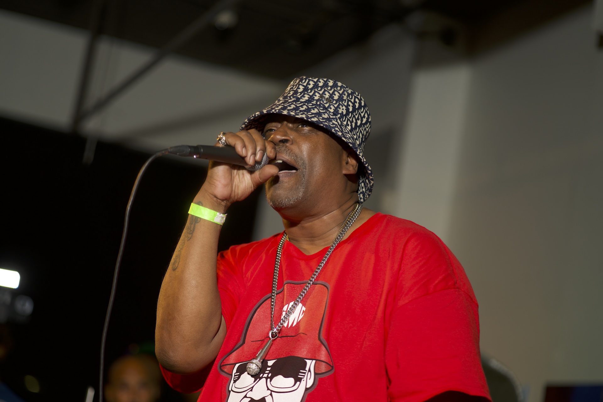 Host Grandmaster Caz onstage at the 2022 National Hip-Hop Museum Induction Ceremony in Atlanta at Atlantucky Brewery, August 26, 2022