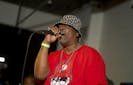 Host Grandmaster Caz onstage at the 2022 National Hip-Hop Museum Induction Ceremony in Atlanta at Atlantucky Brewery, August 26, 2022