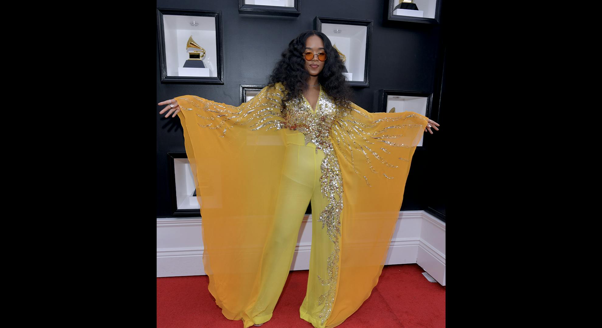 H.E.R. attends the 64th Annual GRAMMY Awards at MGM Grand Garden Arena on April 03, 2022 in Las Vegas, Nevada. (Photo by Lester Cohen/Getty Images for The Recording Academy)