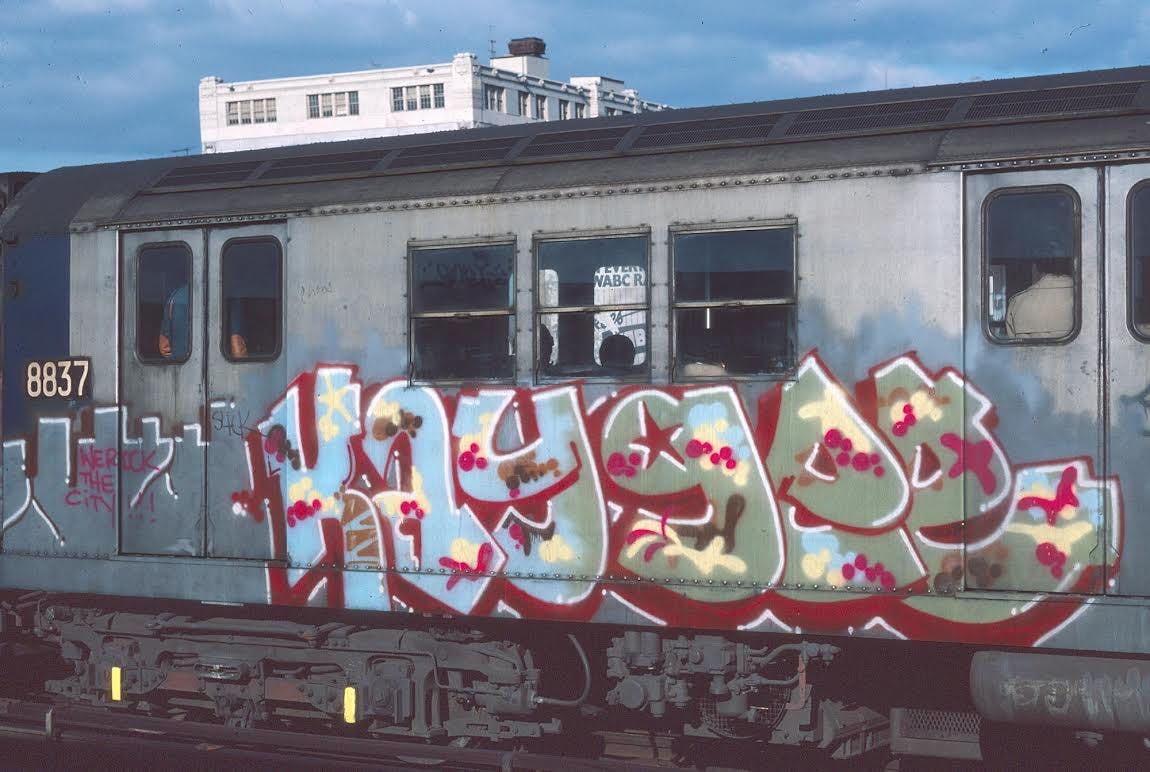 DEZ/KayGee graffiti on a train