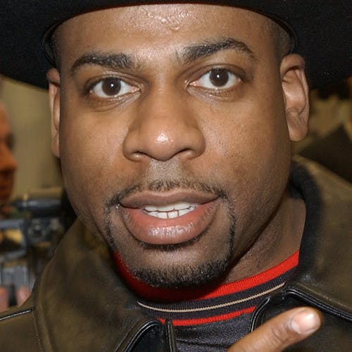Jason "Jam Master Jay" Mizell holds a toy figure of himself at a ceremony honoring hip-hop group RUN-DMC's induction into the Hollywood RockWalk February 25, 2002 at the Guitar Center in Hollywood, California. (Photo by Vince Bucci/Getty Images)
