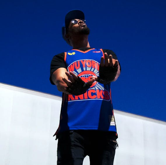 RZA wearing the Wu York Knicks Jersey
