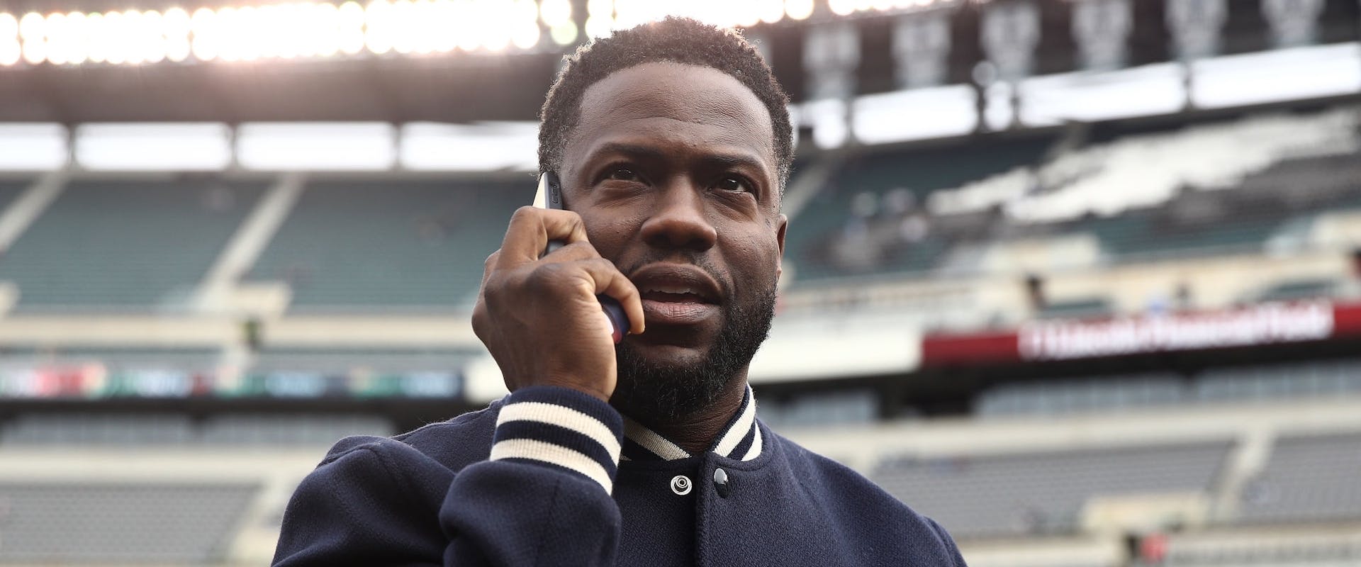 Entertainer Kevin Hart on the field before the game between the Philadelphia Eagles and New Orleans Saints at Lincoln Financial Field on November 21, 2021 in Philadelphia, Pennsylvania. 