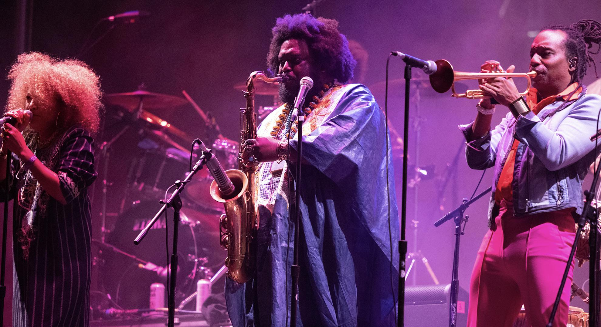 Musician Kamasi Washington (C) performs onstage during the Smokin Grooves Festival at Los Angeles State Historic Park on March 19, 2022 in Los Angeles, California. (Photo by Scott Dudelson/Getty Images)