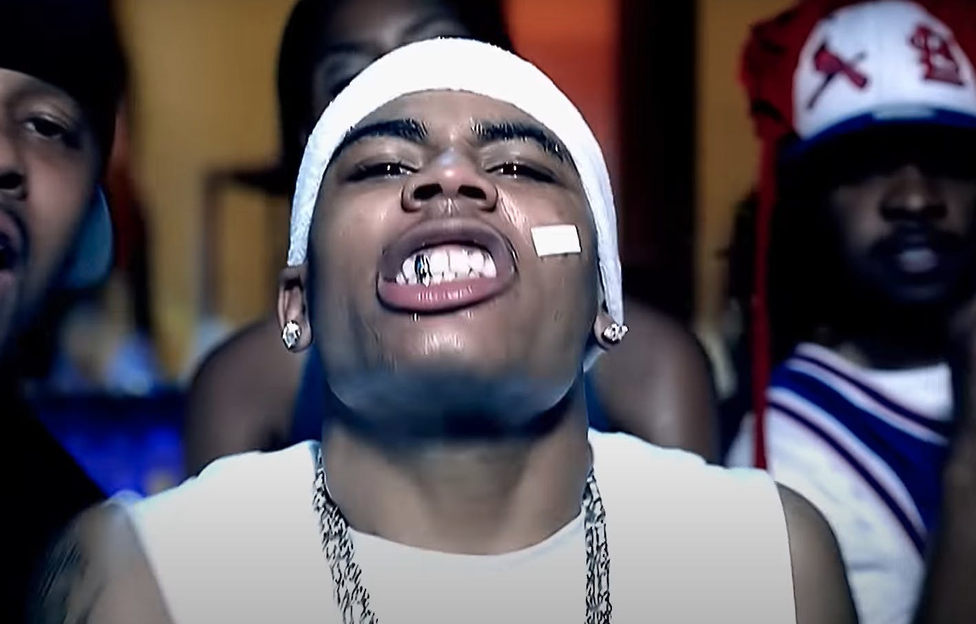 Nelly wearing a Band-Aid