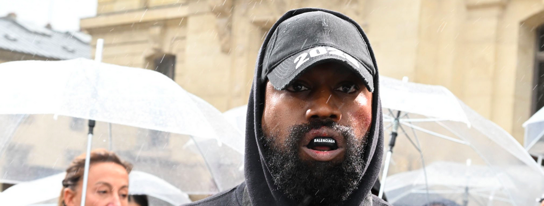 PARIS, FRANCE - OCTOBER 02: (EDITORIAL USE ONLY - For Non-Editorial use please seek approval from Fashion House) Kanye West attends the Givenchy Womenswear Spring/Summer 2023 show as part of Paris Fashion Week on October 02, 2022 in Paris, France.
