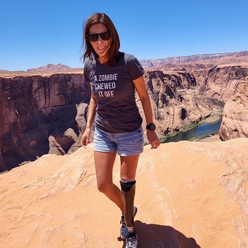 Woman posing in front of canyon in ROKA sunglasses