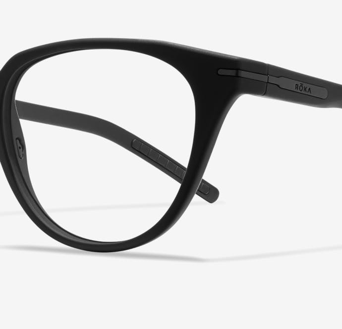 Angled view of cat eye, matte black Lola eyeglasses