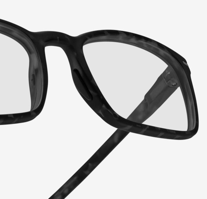 Angled view of sharp rectangular, matte black Palmer eyeglasses