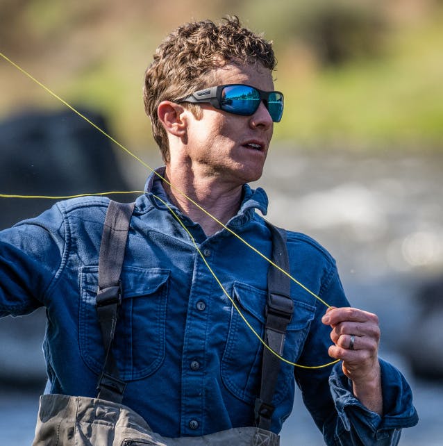 Fisherman wearing ROKA sunglasses