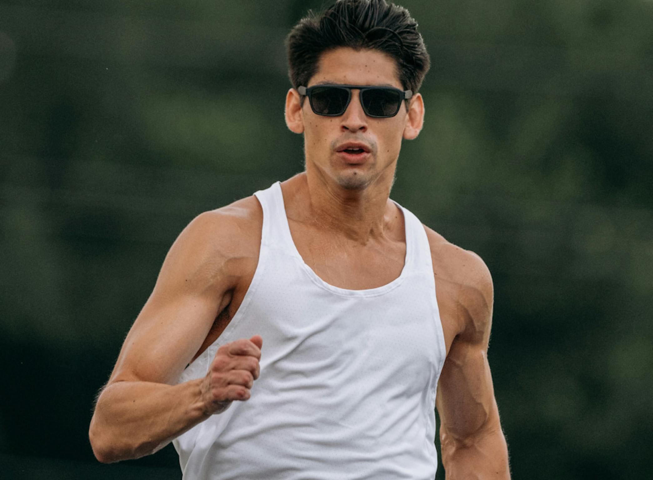 Man running wearing Estacado sunglasses