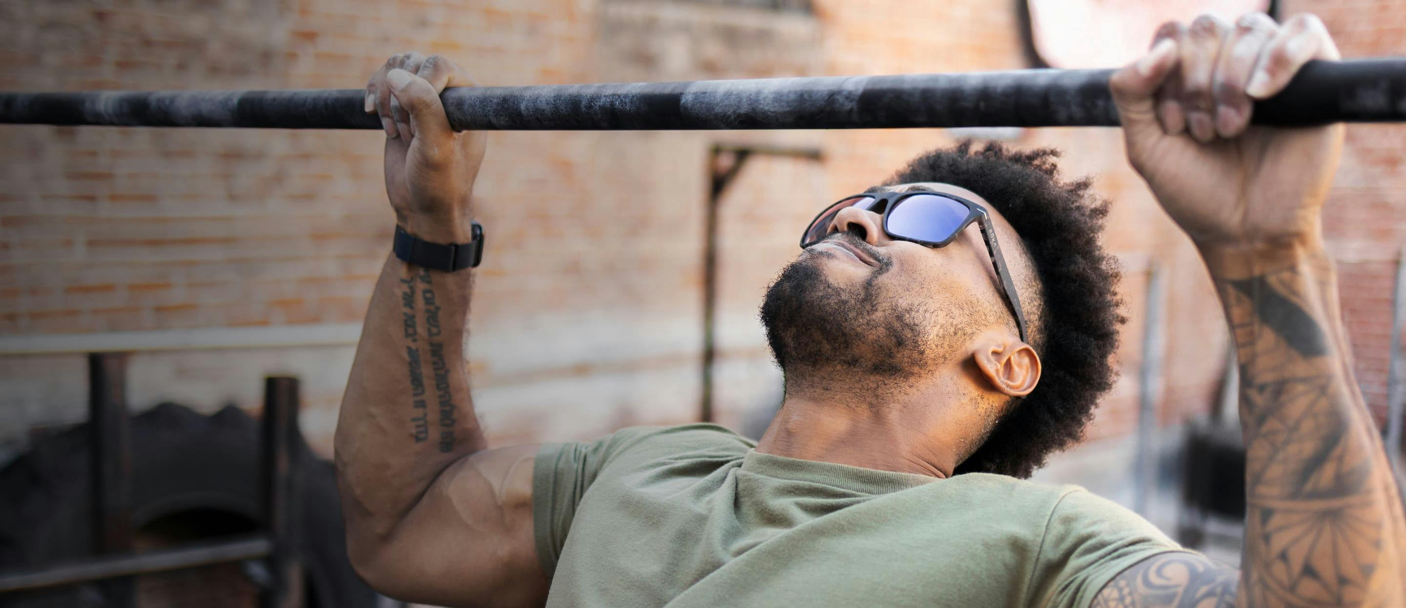 Man working out wearing Barton sunglasses