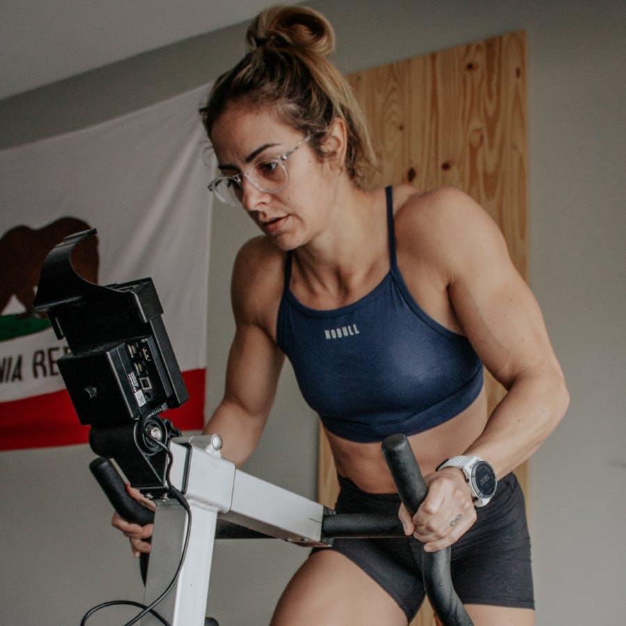 Woman training on stationary bike