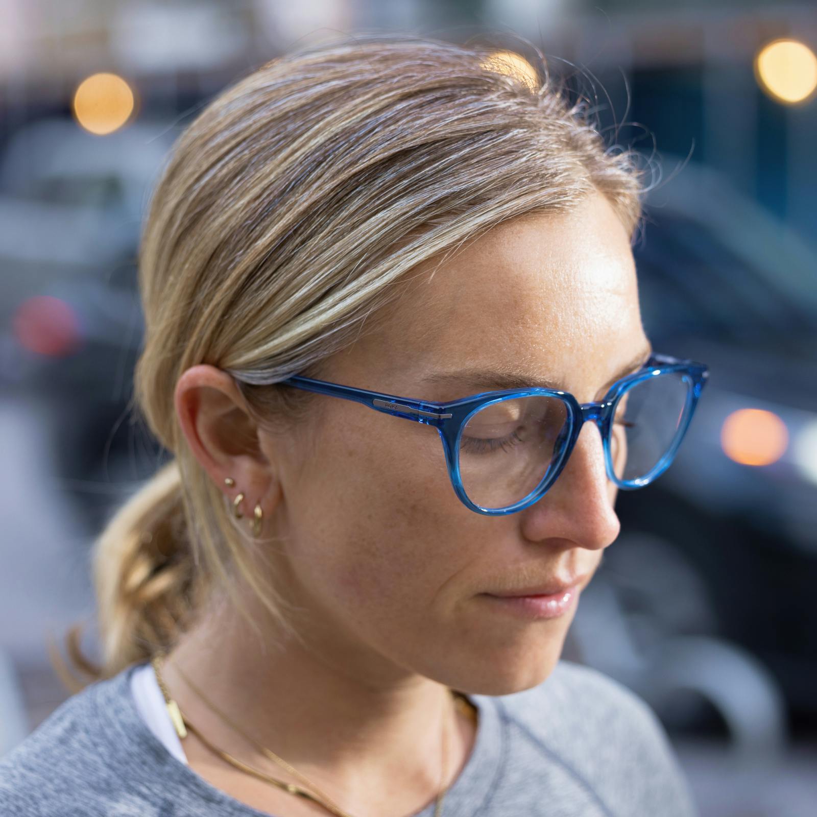 Woman in Blue Lola eyeglasses