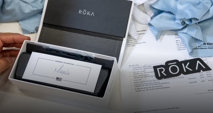 ROKA eyewear packaging with order note and ROKA sticker