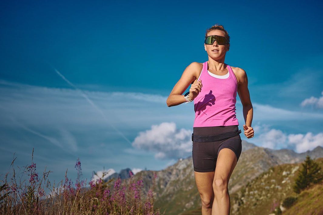 Woman running in ROKA shield sunglasses