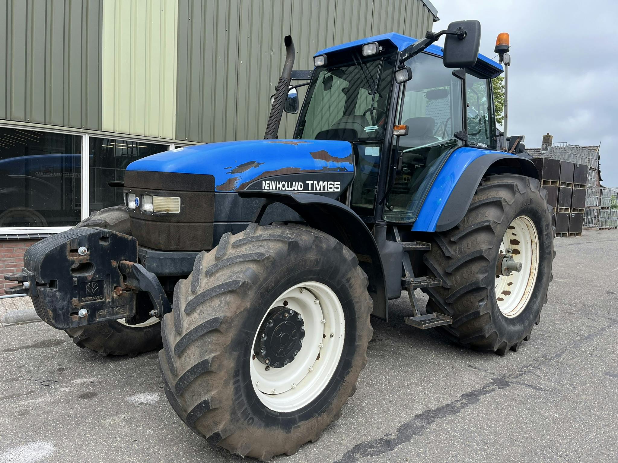 {"type":"heading3","text":"New Holland TM165","spans":[],"direction":"ltr"}