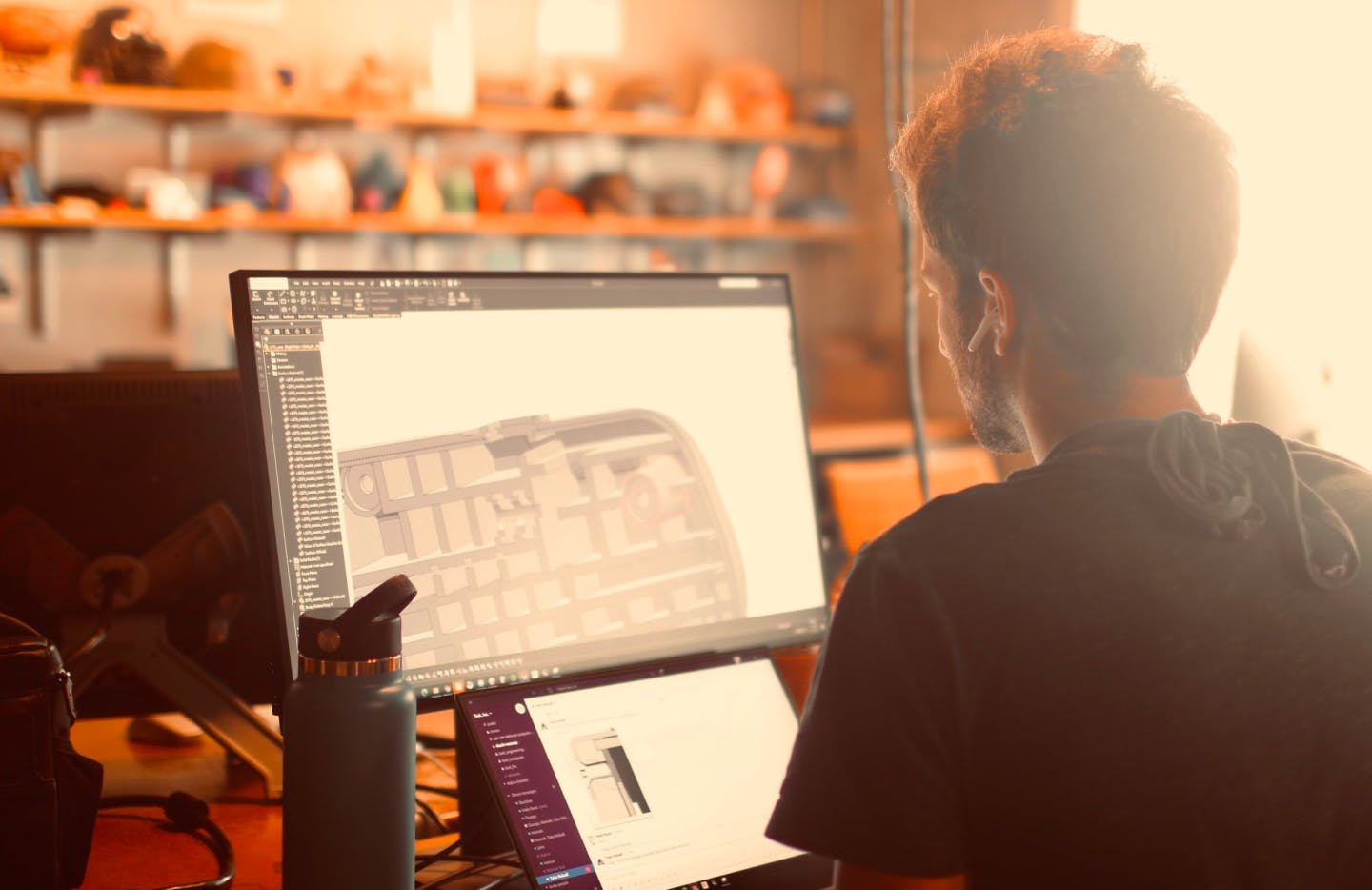 Employee working in front of computer.