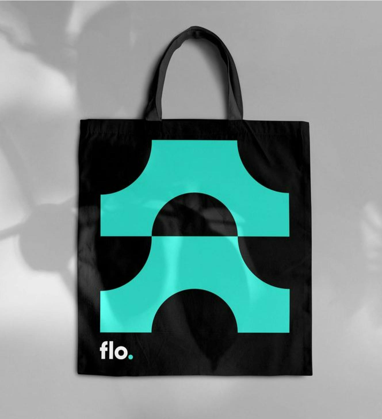 Black tote bag with Mint icon from the Flo icon library.