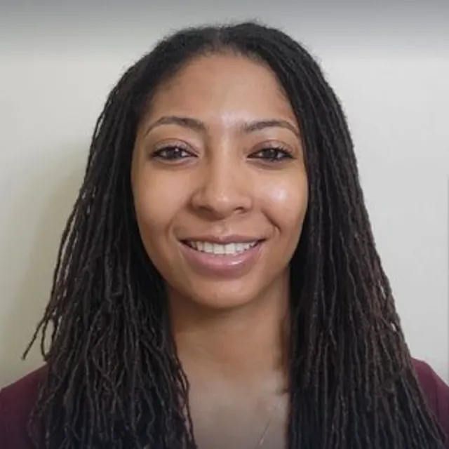 Woman smiling at a camera