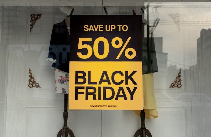 Black Friday image in a window by Ashkan Forouzani on Unsplash